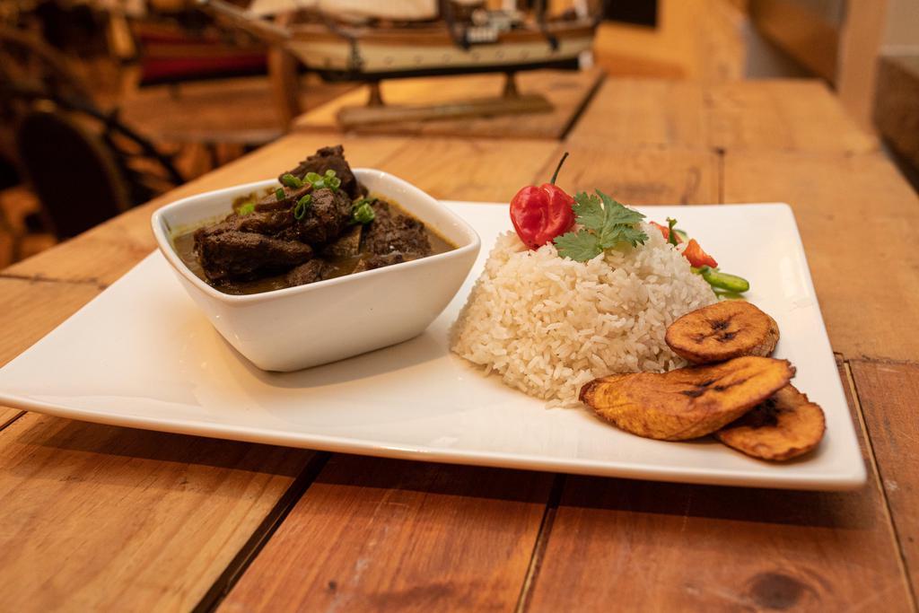 Curry Beef · Seasoned beef & potatoes, slow simmered in our Island curry sauce.
