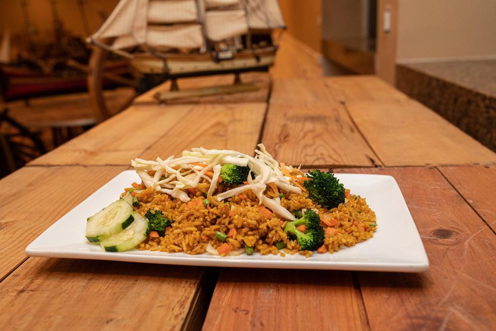 Vegetable Fried Rice · Fried rice, stir fried with fresh mixed vegetables.