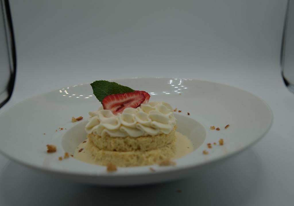 Tres Leches · Traditional Three Milk Soaked Cake, Whipped Cream, Toasted Cookie Crumb