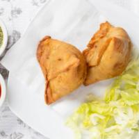 1. Vegetable Samosa · 2 pieces. Crispy turnover, delicious filled with mildly spices potatoes and green peas.