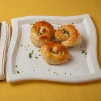 3 Garlic Knots · Rolled baked garlic bread.