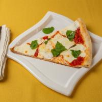 Margarita Pizza · Plum tomato sauce, fresh mozzarella and basil.