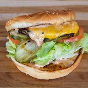 Cheeseburger · American or Swiss cheese, lettuce, tomato, pickles, and secret sauce.