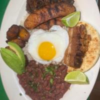 Mini Bandeja Paisa · 6 oz. grilled skirt steak, fried pork, arepa, eggs, plantain, avocado, chorizo, rice and cha...