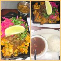 Pollo Norteno · Boneless achiote marinado, melted cheese, cured red onion served with rice, tortillas and sa...
