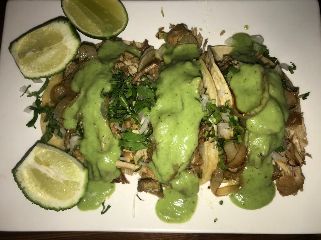 Carnitas Tacos · 3 pieces. Cilantro and onions.
