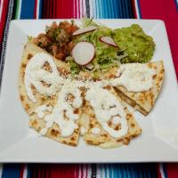 Flor de Calabaza Quesadilla · Pumpkin flowers.