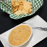 Queso · House-made queso with tortilla chips.
PLEASE NOTE:  SPECIAL INSTRUCTIONS OR REQUESTS MAY NOT...