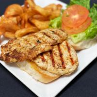 The Yardbird Sandwich · Grilled or Fried chicken breast on a sourdough bun with mayo, lettuce, & tomato.  Served wit...