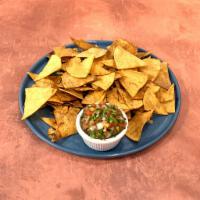 Chips & Salsa (4 oz) · Fresh tortilla chips. Salsa.