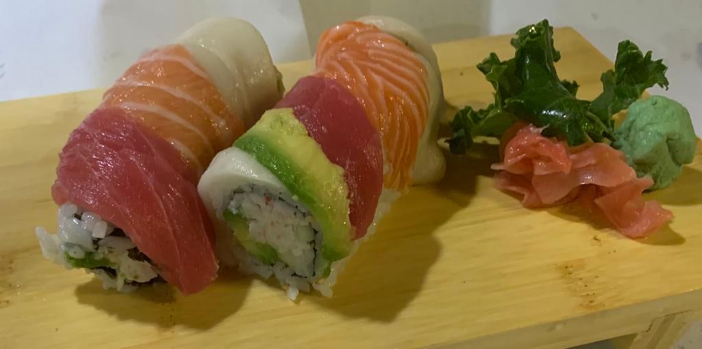 Rainbow Roll · California roll, tuna, and salmon white fish on top.