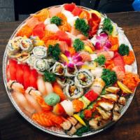Special C Sushi, Sashimi and Roll Combo · 170 pieces. 7 people. Sushi nigiri 20 pieces, California roll, dragon roll, spicy tuna roll,...