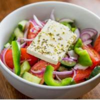 Horiatiki Greek Salad · Tomato, cucumber, green peppers, kalamata olives, red onion, olive oil, and imported Greek f...
