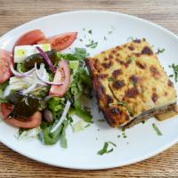 Moussaka Eggplant Casserole · Layer of eggplant, ground beef, potato and béchamell sauce. 
Served with choice of soup or s...