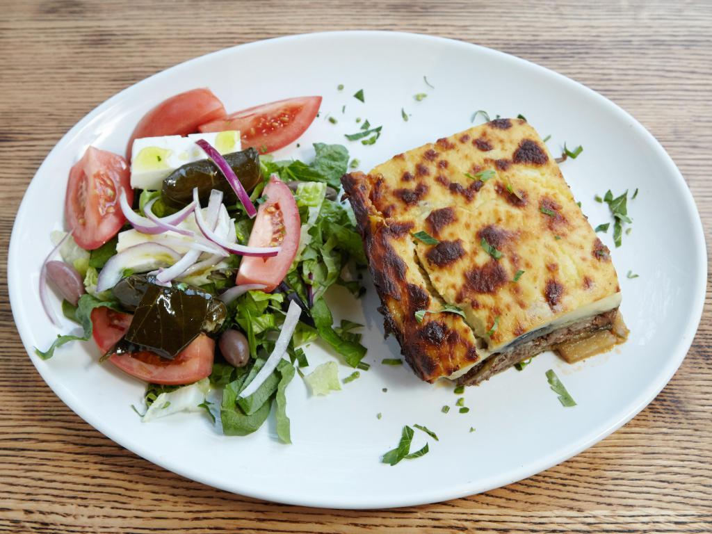 Moussaka Eggplant Casserole · Layer of eggplant, ground beef, potato and béchamell sauce. 
Served with choice of soup or salad.