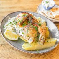 Charcoal Half Chicken · Seasoned with salt, pepper, and lemon dressing. Served with a choice of two sides, and a sou...