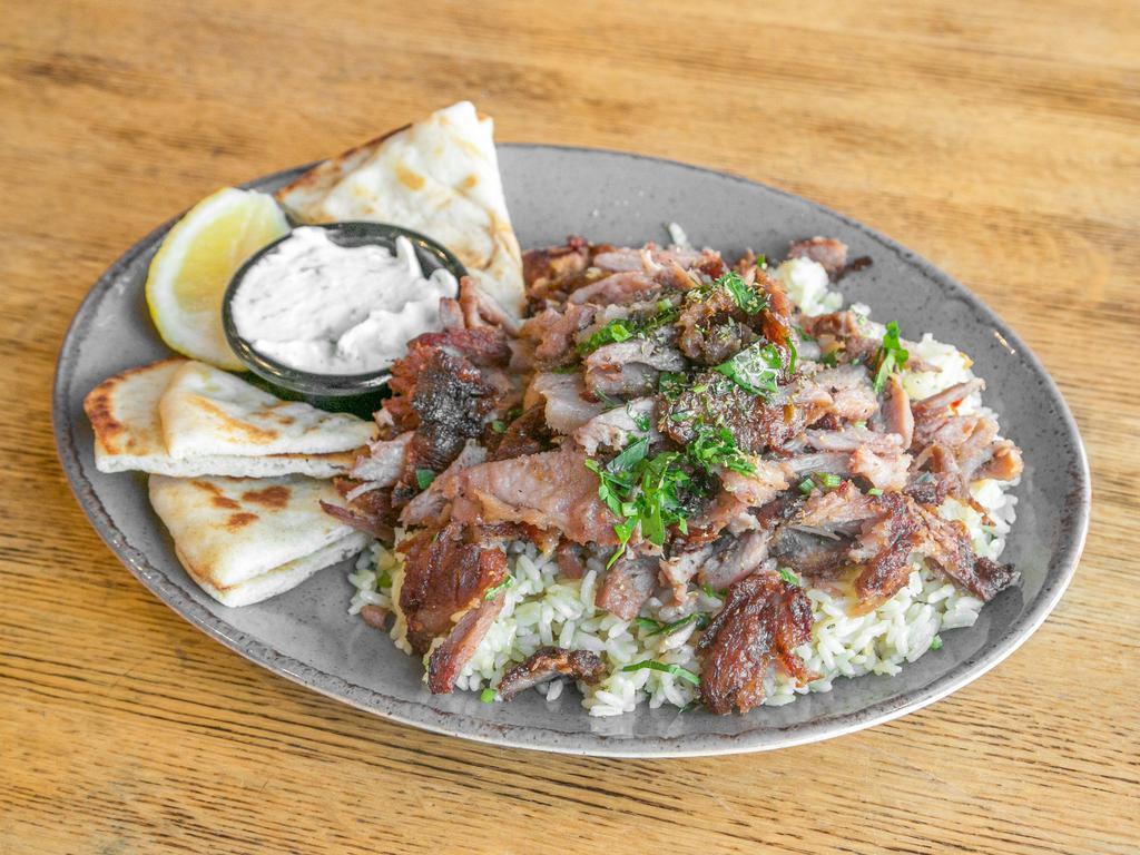 Chicken Gyro Platter · Thinly-sliced marinated chicken gyro.  Served with pita bread, homemade tzatziki sauce, a choice of one side, and a soup or salad.