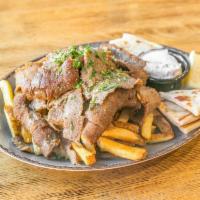 Lamb and Beef (Mix) Gyro Platter · Whole pieces of thinly-sliced lamb and beef.  Served with pita bread, homemade tzatziki sauc...