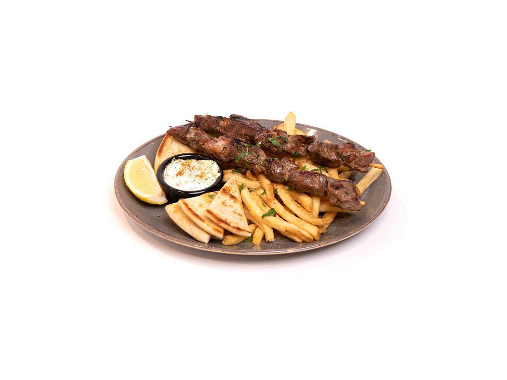 Pork Souvlaki (Skewers) Platter · Two skewers of marinated chunks of pork, seasoned with lemon juice.  Served with pita bread, homemade tzatziki sauce, a choice of one side, and a soup or salad.