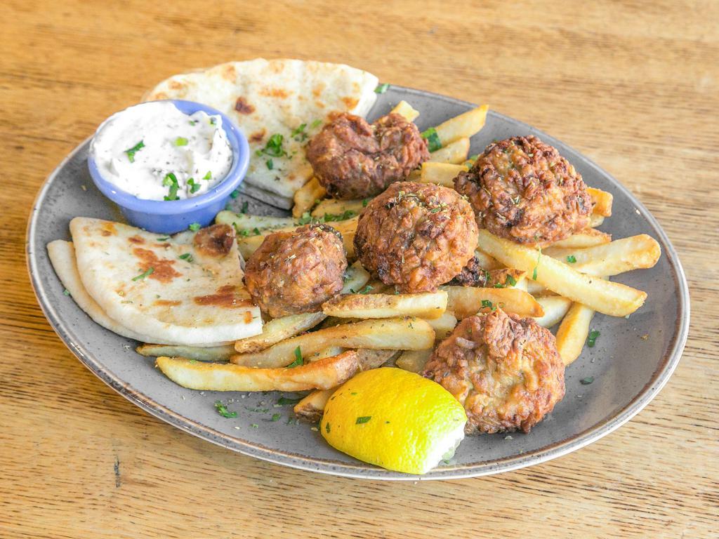 Zucchini Platter · Five homemade zucchini croquettes. Served with pita bread, homemade tzatziki sauce, a choice of one side, and a soup or salad.