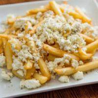 Greek Fries · Served with crumbled feta cheese, salt, and oregano.