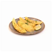 Greek Roasted Lemon Potatoes · Roasted peeled potatoes with garlic, lemon, and oregano