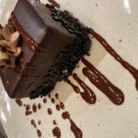 Choco Cravers · Double layered chocolate sponge and dense dark chocolate cream encased in dark chocolate.
