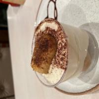 Tiramisu · Ladyfingers soaked in Marsala wine and espresso syrup, layered with elegant mascarpone cream...