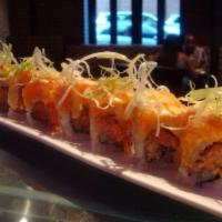 Spicy Girl Roll · Inside spicy tuna and crunch. Topped with spicy salmon and spicy scallion mayo.