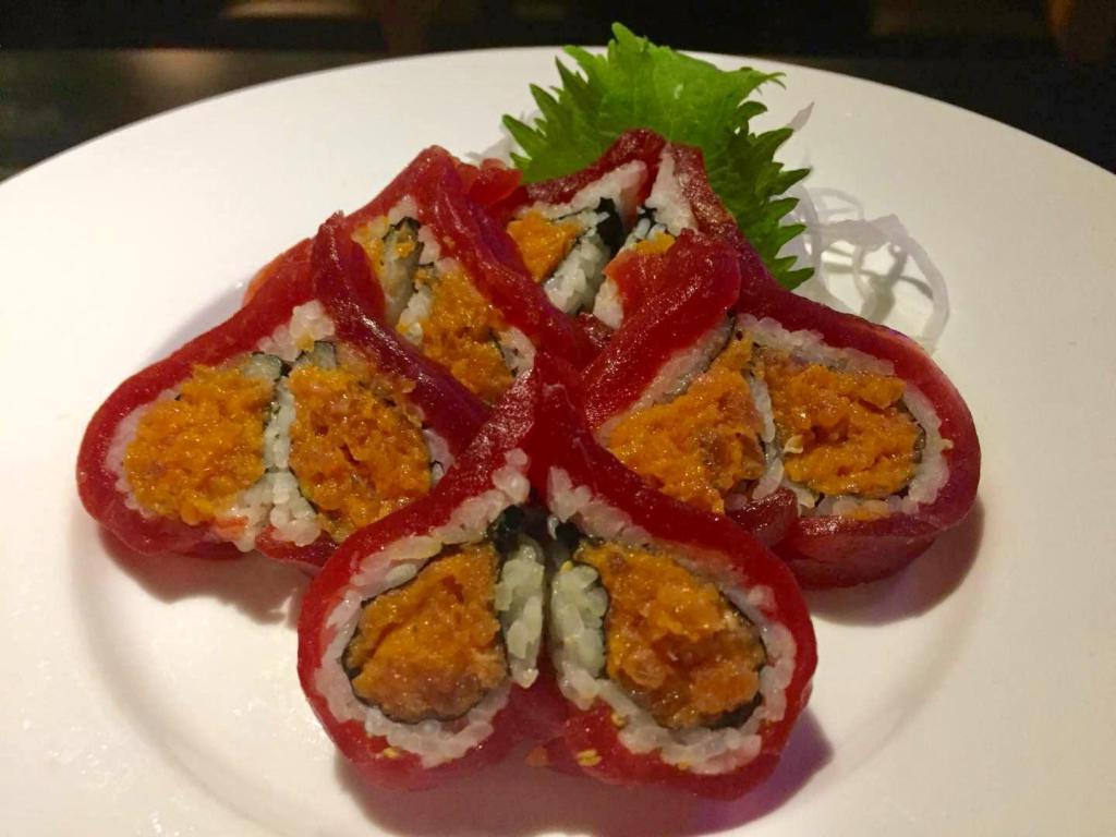 Sweet Heart Roll · 10 pieces. Spicy tuna, avocado and tuna on the top.