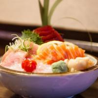Trio Sashimi · 5 pieces each of tuna, 5 pieces salmon and 5 pieces yellowtail.