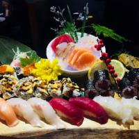 Sushi and Sashimi Combo for 2 · 10 pieces of sushi and 20 pieces of sashimi served with tuna roll and godzilla roll and. Ser...