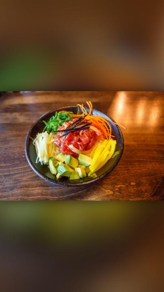 Ahi Tuna Poke Bowl · Tuna, sweet onion, cucumber, avocado, oshinko, seaweed salad with house special poke sauce.