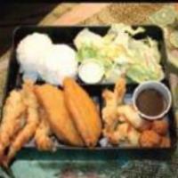 Seafood Platter Special · Deep fried scaloop, cod fish, prawn tempura, and squid fries. Served with rice and salad.