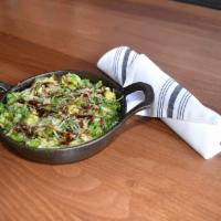 Shaved Brussel Sprouts Plate · Crisp Prosciutto, Parmesan and balsamic reduction. 