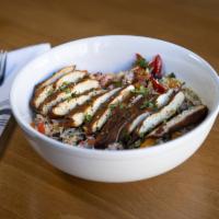 Blackened Chicken Burrito Bowl · Basmati rice, black beans, sautéed fajita veggies, cilantro, pico de gallo, white queso sauce