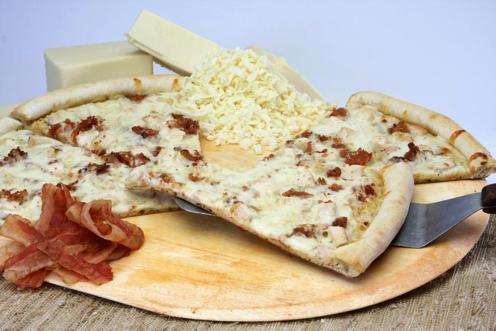 Chicken Bacon Ranch Pizza · Chunks of chicken, bacon, mozzarella cheese and ranch dressing.