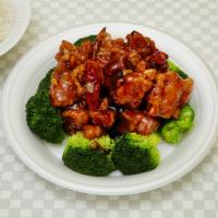 H4. General Tso's Chicken · Chunks of chicken deep fried & sauteed in Hunan sauce and plain broccoli on the side. Hot an...