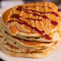 PB&J Pancake · Drizzled peanut butter and grape jelly