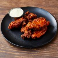 Chicken Wings · Mild, medium, hot or BBQ. Served with bleu cheese dressing.
