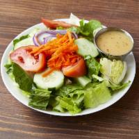 Tossed Salad · Romaine iceberg lettuce, tomato, cucumbers, onions and olives. Served with your choice of dr...