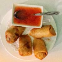 A8. Vegetarian Spring Rolls · 2 vegan rolls filled with cabbage, carrots and celery.