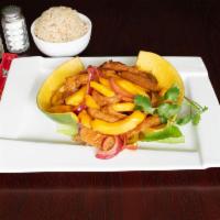 M4. Mango Chicken · Fresh strips of mango, vegetarian chicken sauteed onions and red bell peppers sauteed in a c...