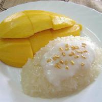Sweet Sticky Rice with Mango · Sweet sticky rice with mango & coconut milk on top.