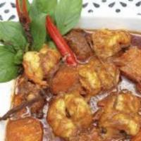 Massaman Curry Shrimp. · Made traditional style, with potato, onion and peanut.