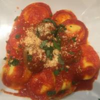 Cheese Ravioli  · ricotta filled ravioli and tomato sauce.