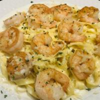Shrimp Lovers Alfredo · 12 large shrimp on a bed of our fresh fettuccine noodles that have been tossed with our Sign...