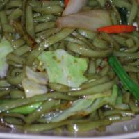 Chow Chow Chowmein · Your choice of protein stir fried with spinach noodles, cabbages, shredded carrot, bean spro...