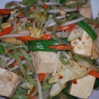 Tofu Veggie Chowmein · Stir fried spinach noodles with bean sprouts, shredded cabbage, baby corns, carrots, onions ...