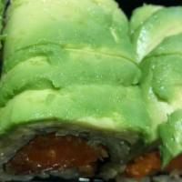 Spicy Green Salmon Roll · Spicy salmon with crunch topped with avocado.